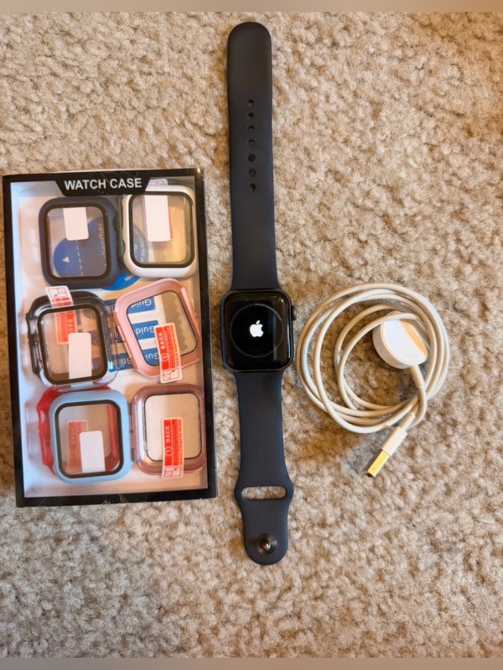 Apple Watch Series 6 40mm with 9 Screen Protective Cases and Charging Cord